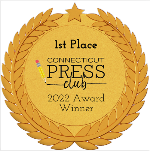 Gold seal with laurels and a star at the top. It says 1st Place Connecticut Press Club 2022 Award Winner.